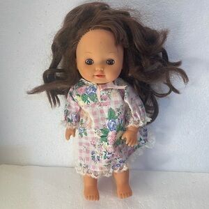 Vintage doll brunette wavy hair brown sleepy eyes pink floral dress